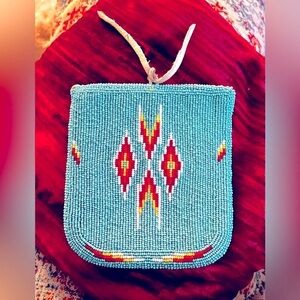 Native American beaded white deerskin belt pouch.